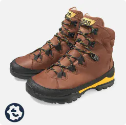 Braune Bergkomfort Wanderstiefel 2.0 mit gelben Akzenten und festem Profil, ideal für anspruchsvolle Wanderungen.
